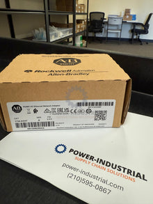 Allen Bradley 1734-AENT EtherNet/IP I/O adapter in a brown cardboard box with black logos.