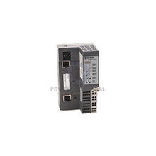 Allen Bradley 1734-AENT EtherNet/IP I/O adapter, gray plastic, with two Ethernet ports and status LEDs.
